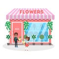 Children standing in front of the flower store Royalty Free Stock Photo