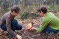 Children starting a campfire Royalty Free Stock Photo