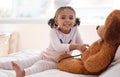 Children, stethoscope and teddy bear with a girl playing doctor in her bedroom at home with a stuffed animal Royalty Free Stock Photo