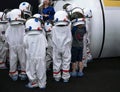 Children in a suit of astronauts Looking Astronaut Space In Museum