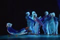 Children in a suit of penguins dance on a stage, Children`s danc