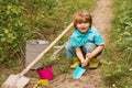 Children summer activities. Carefree childhood. Little Farmer boy examining Common fig crop in plantation or field. Royalty Free Stock Photo