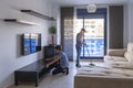 Children sweeping floor and cleaning dust in living room at home. Housekeeping and household Royalty Free Stock Photo