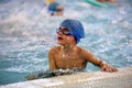 Children swimming competition in pool, relay race Royalty Free Stock Photo