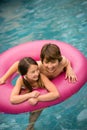 Children swimming inner tube Royalty Free Stock Photo