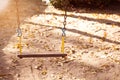 Children Swing in playground at public park with sunset. Royalty Free Stock Photo