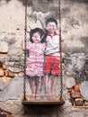 Children on the Swing Street Art Piece in Georgetown, Penang, Ma