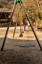 Children swings at wilderness mountain park Royalty Free Stock Photo