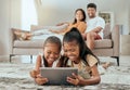 Children, tablet or relax parents in living room of house or family home for education video, movie streaming or Royalty Free Stock Photo