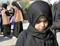 Children takes part in an Ashura ceremony