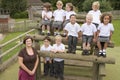 Children and Teacher posing for class photo Royalty Free Stock Photo