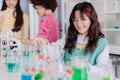 Children teen role playing scientist at fun science chemical lab workshop for learning education in school Royalty Free Stock Photo