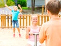 Children are teetering on the swing Royalty Free Stock Photo