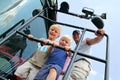 Children and Their Father Smiling as the Climb a Farm Tractor Royalty Free Stock Photo