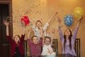 Children throwing confetti at a children& x27;s party. kids have fun together on a family holiday. Royalty Free Stock Photo