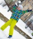 Children throwing snowballs Royalty Free Stock Photo