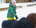 Children throwing snowballs Royalty Free Stock Photo