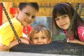 Children On A Tire Swing Royalty Free Stock Photo