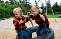 Children on Tire Swing Royalty Free Stock Photo