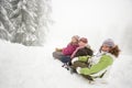 Children on toboggan Royalty Free Stock Photo