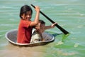 Children in the Tonle Sap lake in Cambodia