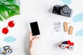 Children tourism outfit with camera and mobile on white background flat lay mockup