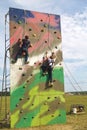 Children are training in rock-climbing Royalty Free Stock Photo