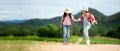 Children travel nature summer trips. Asia people tourism walking on nature road happy and fun explore adventure Royalty Free Stock Photo