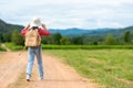 Children travel nature summer trips. Asia people tourism walking on nature road happy and fun explore Royalty Free Stock Photo