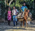 Children travel on foot and horse in rural Haiti.