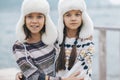 Children travelling in warm wool sweaters and winter hats