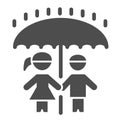 Children under umbrella solid icon, 1st June children protection day concept, Boy and girl standing in rain under one Royalty Free Stock Photo