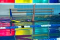 children unrecognizable group swimming freestyle style training in swimming pool with splashing water.