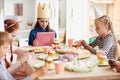 Children Using Gadgets at Party