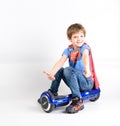 Children using hoverboard, a self-balancing two-wheeled board. Editorial content