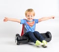 Children using hoverboard, a self-balancing two-wheeled board. Editorial content