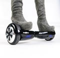 Children using hoverboard, a self-balancing two-wheeled board. Editorial content