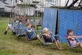 Children wait for a ride to start