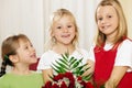 Children waiting with flowers for mother Royalty Free Stock Photo