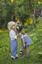 The children walk along the summer garden 4769. Royalty Free Stock Photo