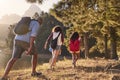 Children Walk By Lake With Parents On Family Hiking Adventure Royalty Free Stock Photo