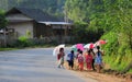 Children walking to home on rural road in Yenbai, Vietnam Royalty Free Stock Photo