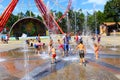 Children wash themselves in fountains of Gorky Park in Kharkiv