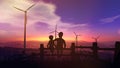 Children watch wind power stations at sunset Royalty Free Stock Photo