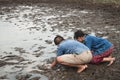 Children and water on arid soil in hot. Royalty Free Stock Photo