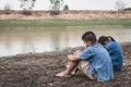 Children and water on arid soil in hot. Royalty Free Stock Photo