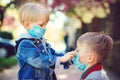 Children wearing face masks outdoors. Prevention coronavirus. Back to school. Coronavirus quarantine