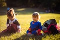 Children wearing Halloween suits in the park Royalty Free Stock Photo