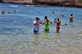 Children wearing snorkling gear, Hanauma Bay beaches, Hawaii.