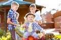 Children working in garden. Kids harvesting in autumn Royalty Free Stock Photo